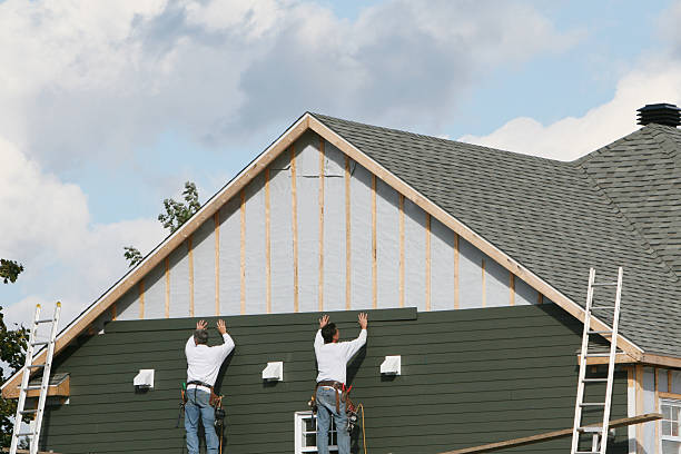 Professional Vinyl Siding technician working in Blue Rock, OH